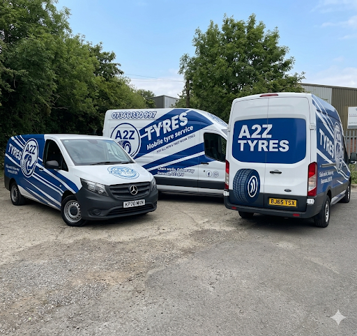 Three A2Z Tyres vans — mobile tyre service fleet parked together